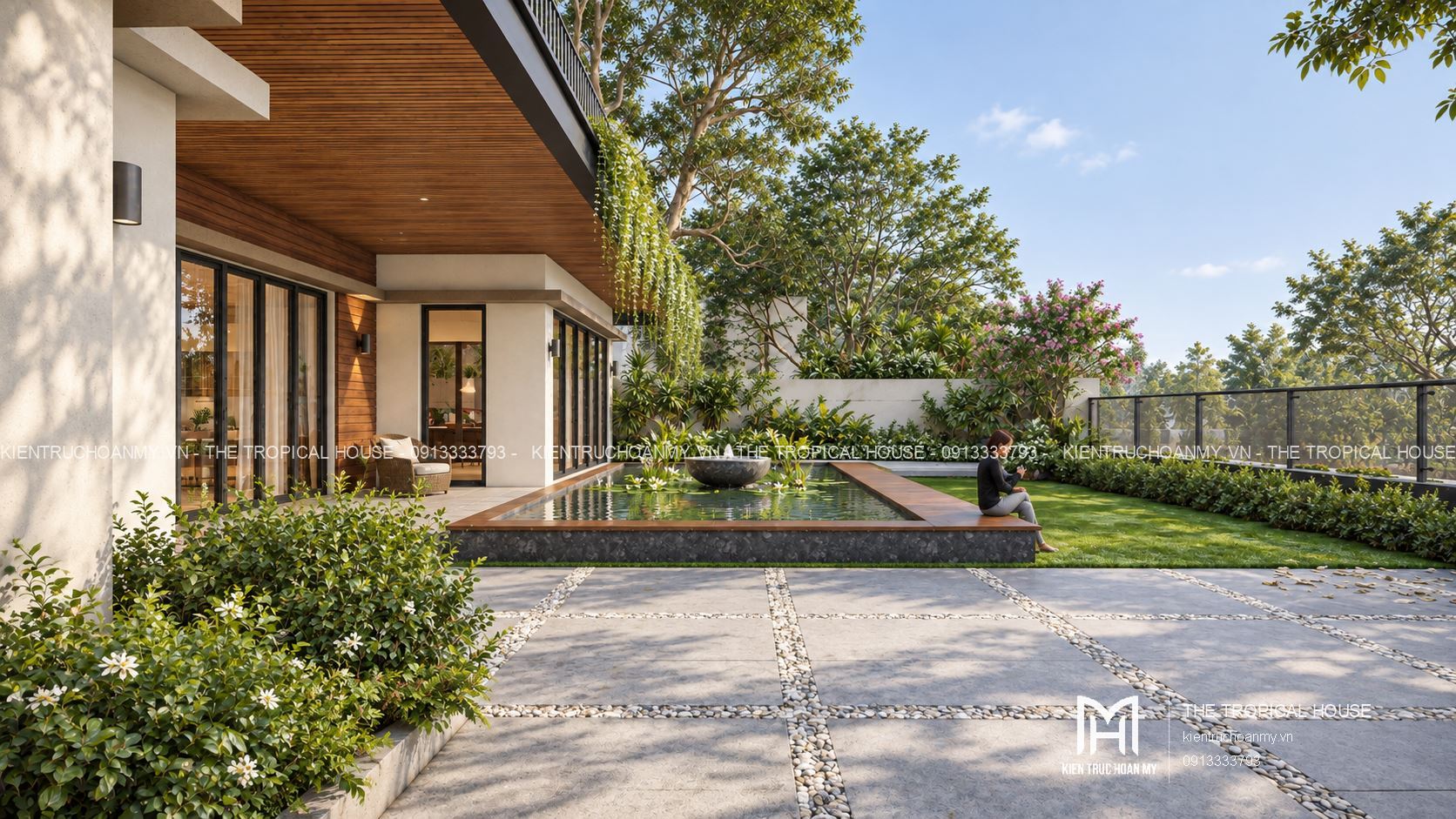 Hiên lát đá của villa bên hồ phản chiếu