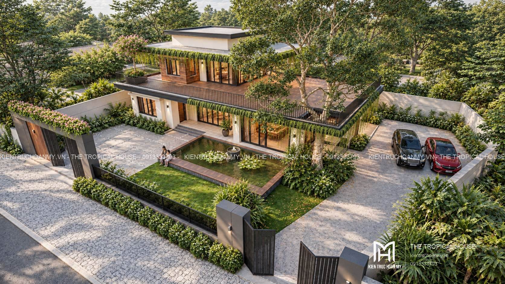 Tổng thể villa với dải đỗ hai xe bên hông nhìn từ trên cao
