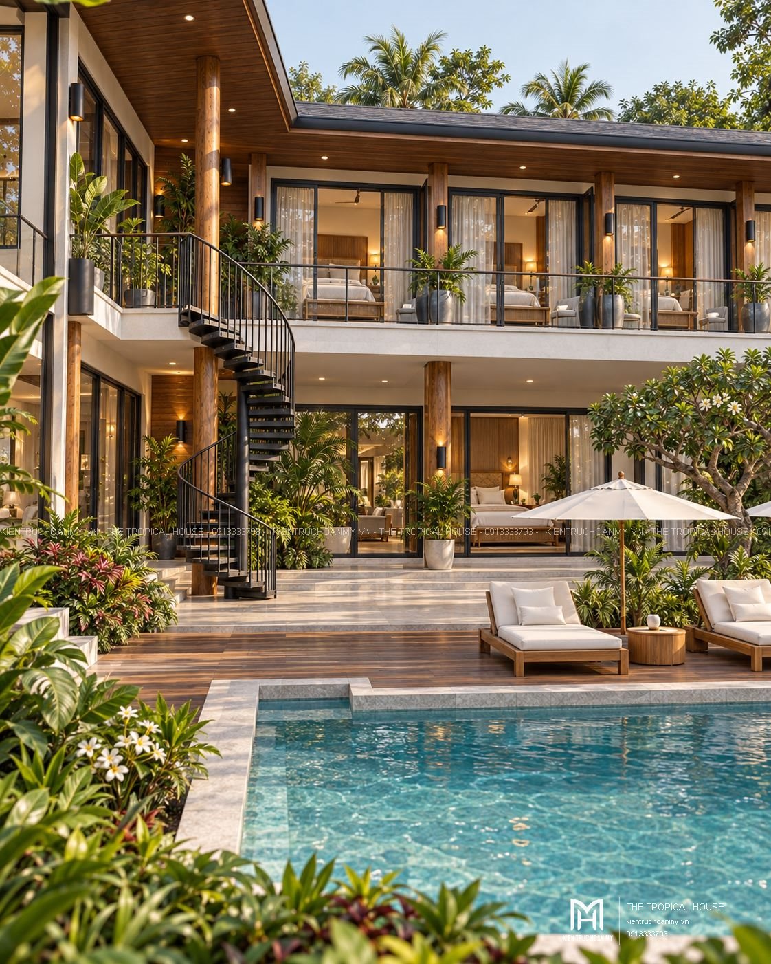 Thang xoắn ngoài trời nối ban công với sân nghỉ của villa