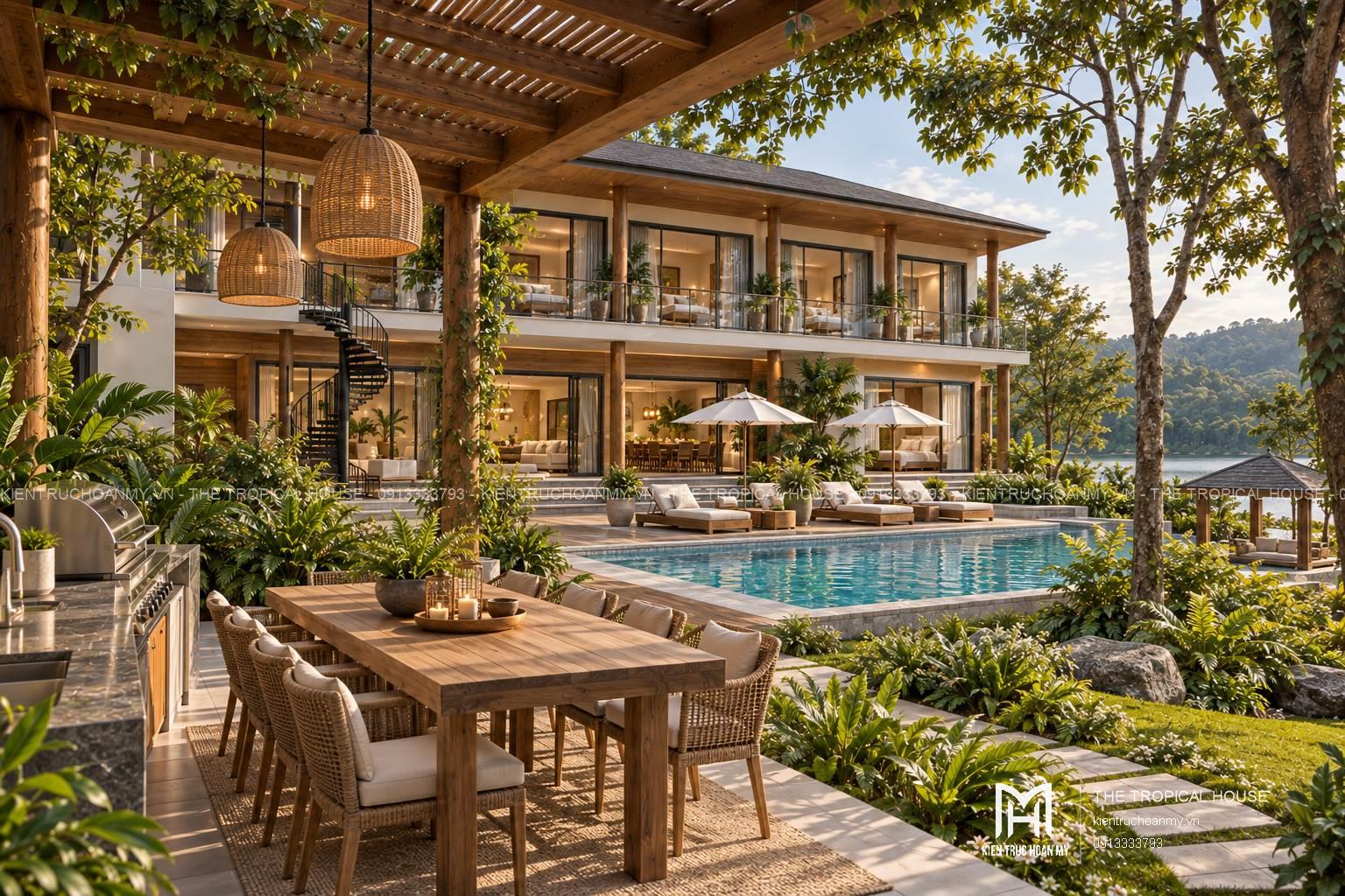 Khu BBQ và bàn ăn ngoài trời dưới pergola gỗ cạnh hồ bơi villa